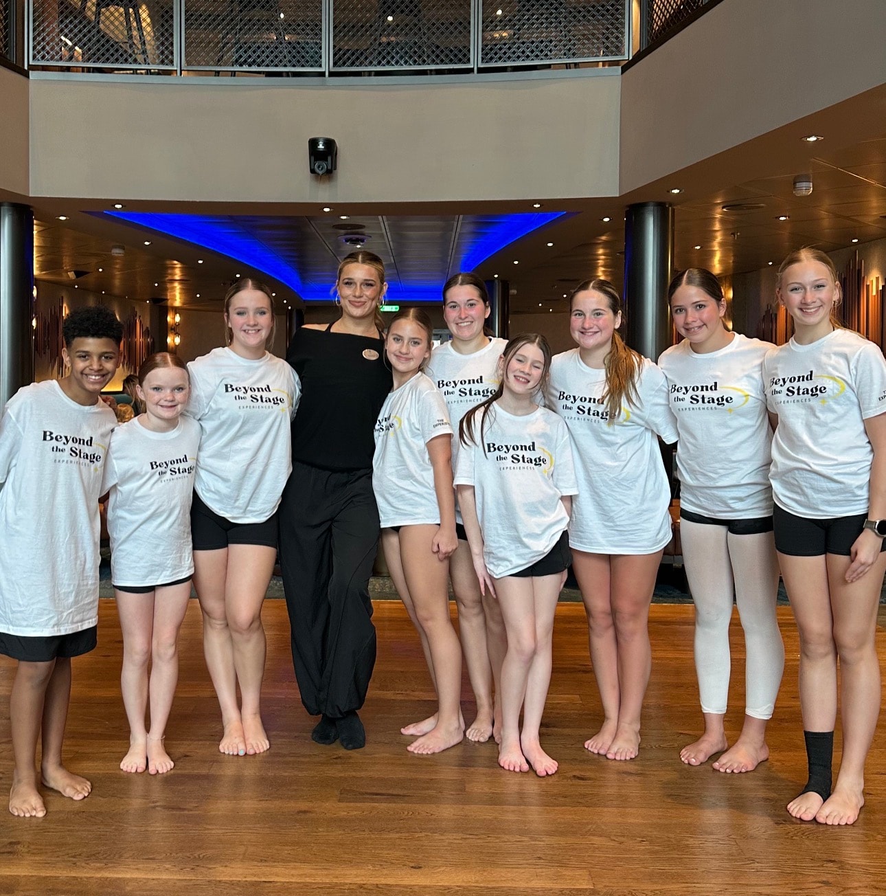 Dancers in Beyond the Stage shirts on cruise