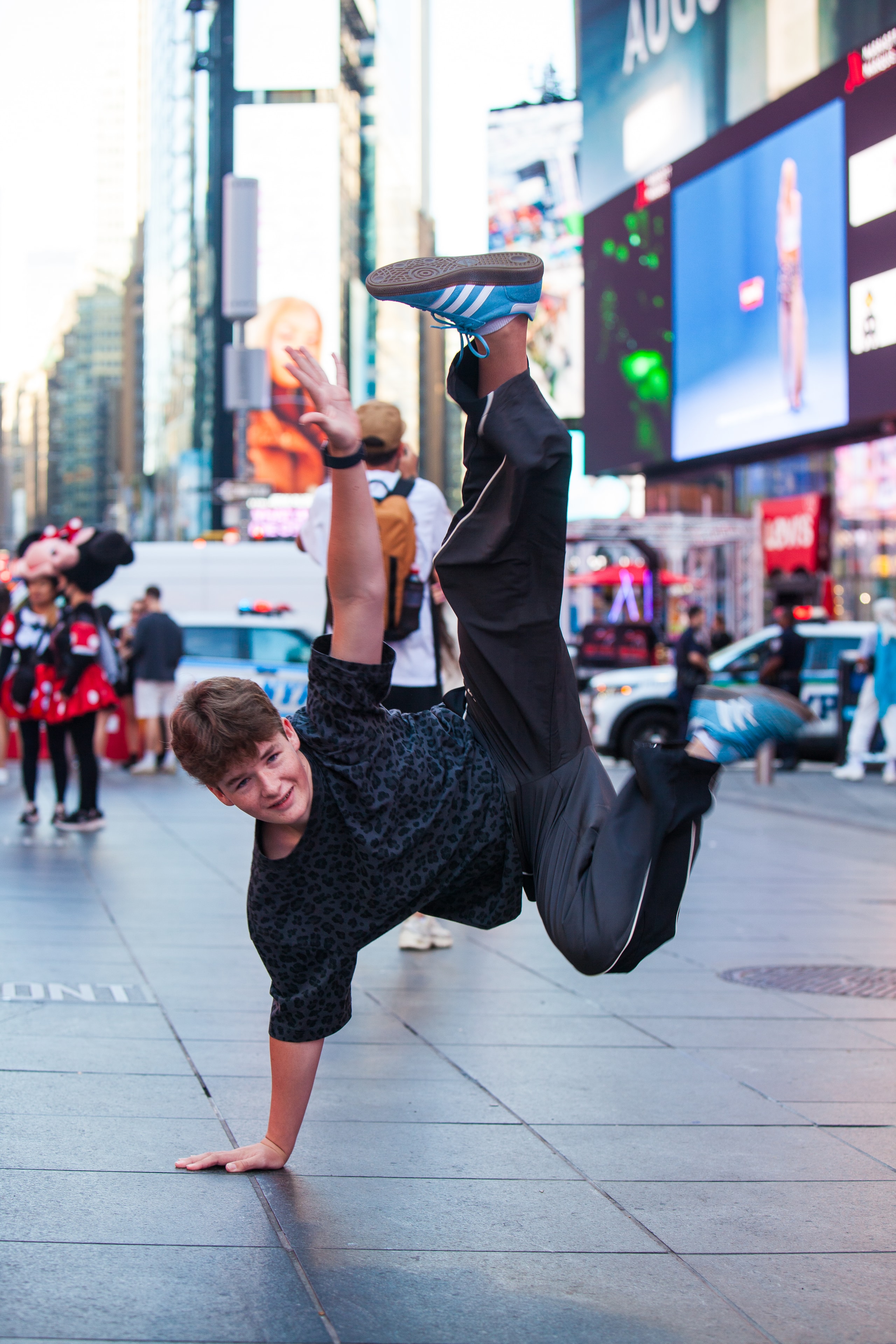 Dancer doing a handstand in Times Square NYC