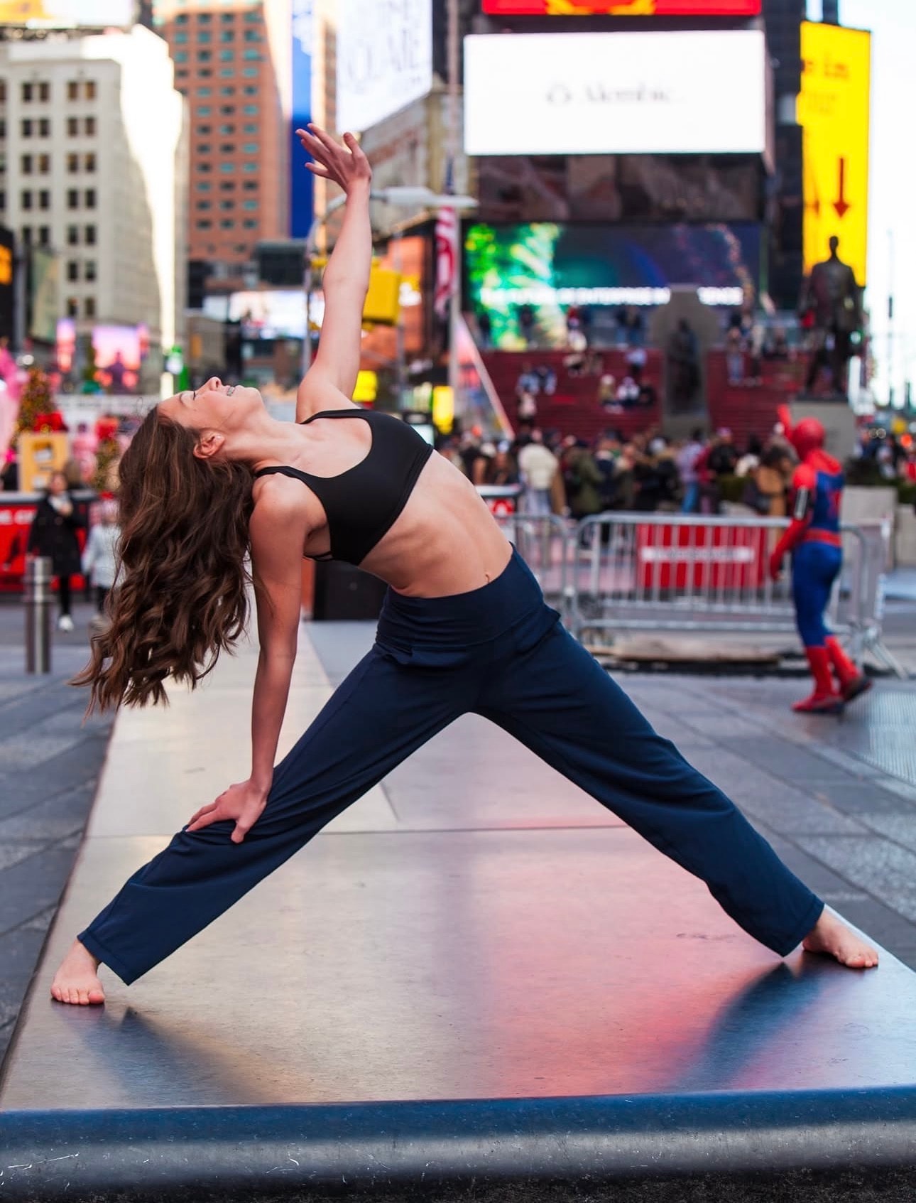 Dancer stretching in Times Square NYC